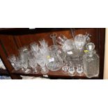 Three glass decanters, a water jug and assorted drinking glasses, etc