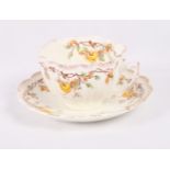 An early 20th Century bone china floral decorated part teaset, a similar Imari style teaset and a