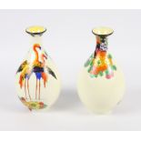 A pair of early 20th Century Royal Doulton bone china flamingo enamel decorated vases, 7" high