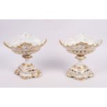 A pair of continental porcelain openwork baskets with gilt decoration, 7 1/2" high