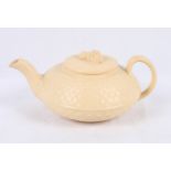 A Wedgwood caneware teapot with basket weave moulded decoration and wheat sheaf knop