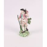 A Derby porcelain figure of a woodman, 7" high (extensively restored), a Dresden cherub, 5 1/2"