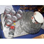 A thistle-shaped liqueur decanter and six matching glasses, seven Coca Cola glasses, three crystal