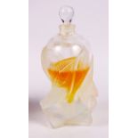 A Lalique perfume bottle in opalescent glass, "Les Elfes Flacon Collection 2002" (partial contents)