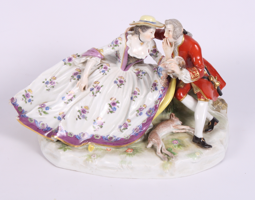 A continental porcelain group of children playing 'blind man's buff', 5" high, a continental