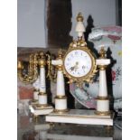 A 19th Century French marble and gilt metal mounted clock garniture comprising central clock with