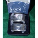 A pair of modern Carrs silver napkin rings, in fitted case, 2.1oz troy approx