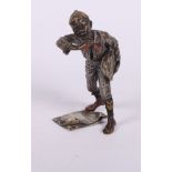 A late 19th Century Austrian cold painted bronze figure of a newspaper seller, 4 1/4" high