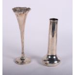 A silver trumpet vase with spiral decoration and weighted base together with a cylindrical silver