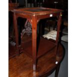 An oak occasional table, on barley twist supports, and a mahogany two-tier occasional table