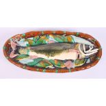 A majolica ware wall plaque of a fish, stamped Minton, 14" wide