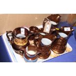 A set of four 19th Century relief decorated copper lustre jugs, four other jugs, a salt and a mug