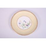 A Minton bone china dessert plate with reticulated ground and floral centre, 9" dia