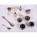 Three silver napkin rings, two silver pepper pots, a pair of novelty 'wish bone' sugar tongs, a
