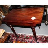 A late 19th Century mahogany side table, fitted frieze drawer, on turned supports, 36" wide