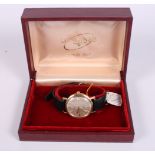 A gentleman's 9ct gold cased Longines Flagship automatic wristwatch with silvered dial, baton