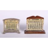 Two oak and silver mounted desk calendars