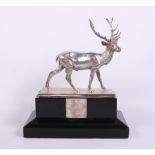 A Mappin & Webb cast silver figure of a stag, on ebonised plinth base with applied engraved silver