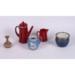 A Royal Doulton flambe glazed coffee pot with silver rim (minor chip to spout) and milk jug, a