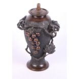 A late 19th Century Japanese bronze oviform vase with high relief vine decoration, 9" high (now