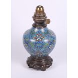 A cloisonne enamel decorated vase on bronzed base, now converted as a table lamp, 12" high