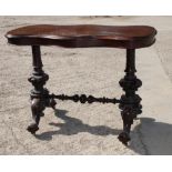 A Victorian burr walnut shape top centre table, on turned and carved twin columns and glazed
