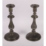 Four pairs of 19th Century brass candlesticks, a pair of pewter candlesticks and a pair of candle