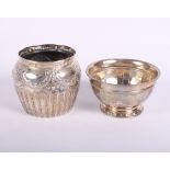 A silver pedestal sugar bowl together with a silver pot with embossed swag and acanthus