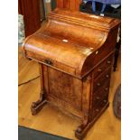 A late Victorian burr walnut piano top Davenport desk with pull-out writing surface and spring