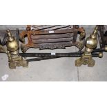 A pair of brass and wrought iron fire dogs of George II design and log rests, 33" wide