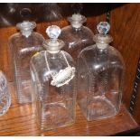 Four late 18th Century cut glass spirit decanters and stoppers