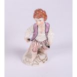 A Meissen figure of two cherubs in a shoe, a continental porcelain figure of two children and a