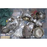 A silver plated three-piece teaset, a plated posy holder stand mounted lion and other plated