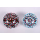 A millefiori red, white and blue cane paperweight, 3" dia, and a similar paperweight, 2 3/4" dia