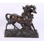 A 19th Century bronze figure of a stallion, 10 1/2" high