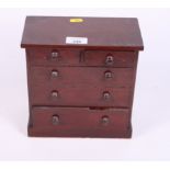 A late 19th Century mahogany miniature chest of two short and three long drawers, 8 1/2" wide