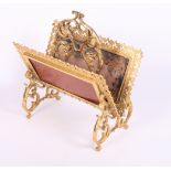 A 19th Century gilt metal openwork letter stand, 8 1/2" high