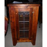 A pine cupboard enclosed leaded glazed door, 29" wide