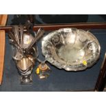 A silver plated and engraved dish with swing handle, a plated cream helmet, an ink well with