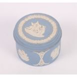 A Wedgwood green and white jasperware box, a smaller similar blue and white box and other jasperware