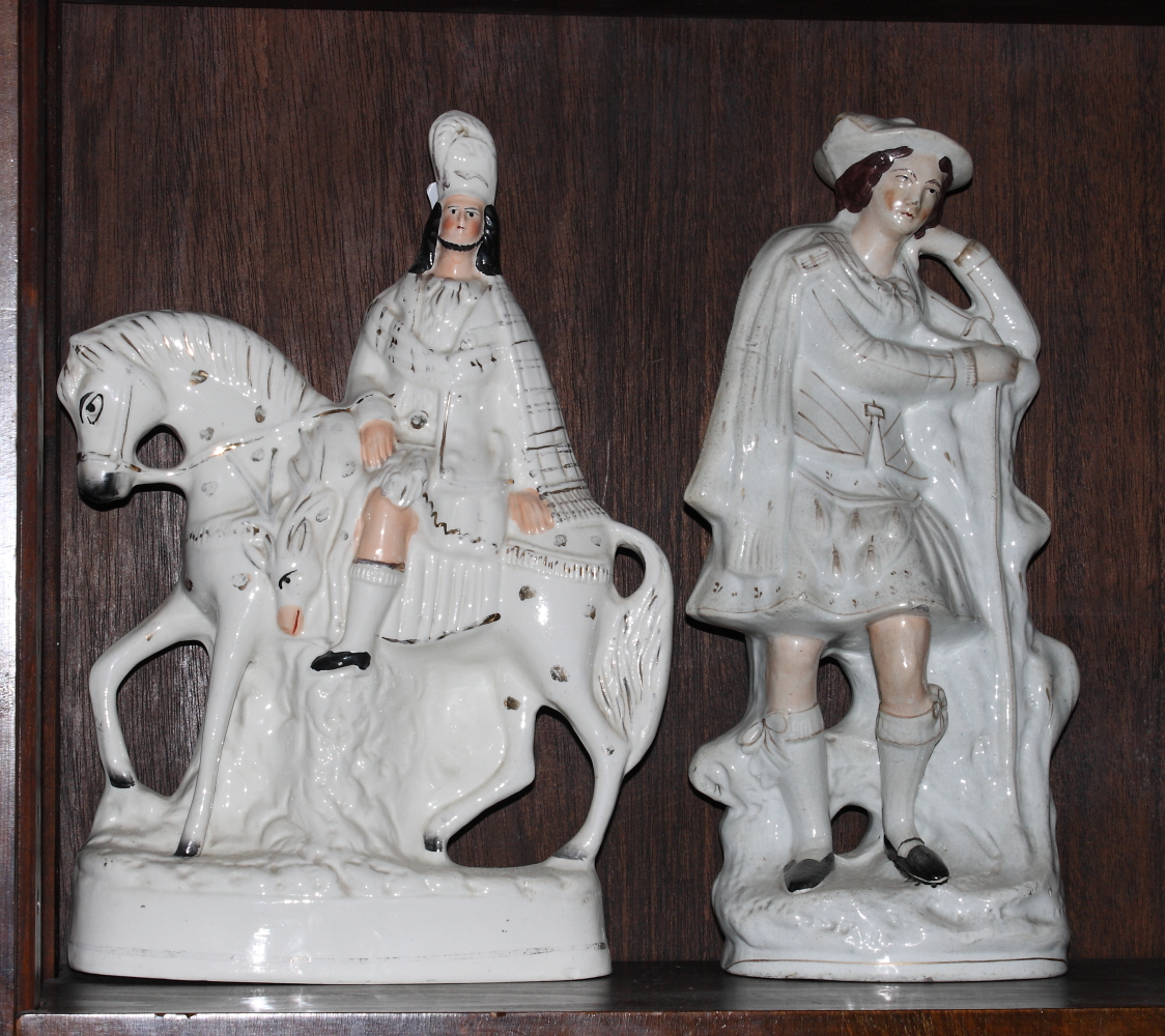 A 19th Century Staffordshire figure of a shepherd, 15" high, and a mounted highlander, 15" high - Image 2 of 2