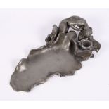 J Debois: a cast pewter desk inkstand formed as a sprite and leaves, 8" long