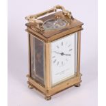 A modern carriage clock by The Henley Carriage Clock Co, in brass case, 6" high