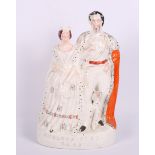 A 19th Century Staffordshire figure group, "King and Queen of Sarbinia", 15" high