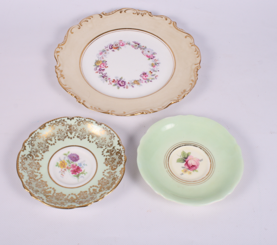 A set of five Paragon bone china rose decorated dessert plates, four 19th Century bone china dessert