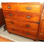 A 19th Century teak and brass mounted military chest of two short and three long drawers, on