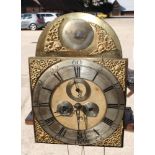 A Georgian oak long case clock with eight-day striking movement, silvered chapter ring, date