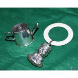 A novelty silver pepper pot in the form of a watering can and a child's silver figural rattle with