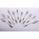 A set of six silver fiddle pattern dinner forks and five matching dessert forks, 19.3oz troy approx