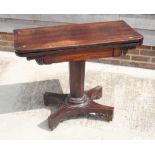 A William IV rosewood fold-over top card table, on octagonal stem and quadriform base with scroll